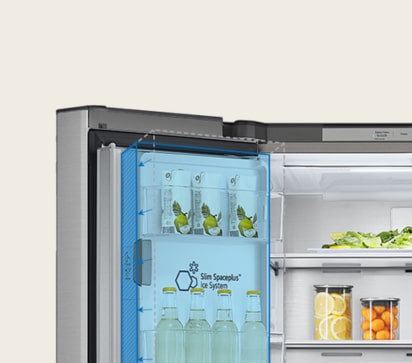 Inside the refrigerator, a slim indoor ice maker is highlighted in blue and the refrigerator is full of ingredients